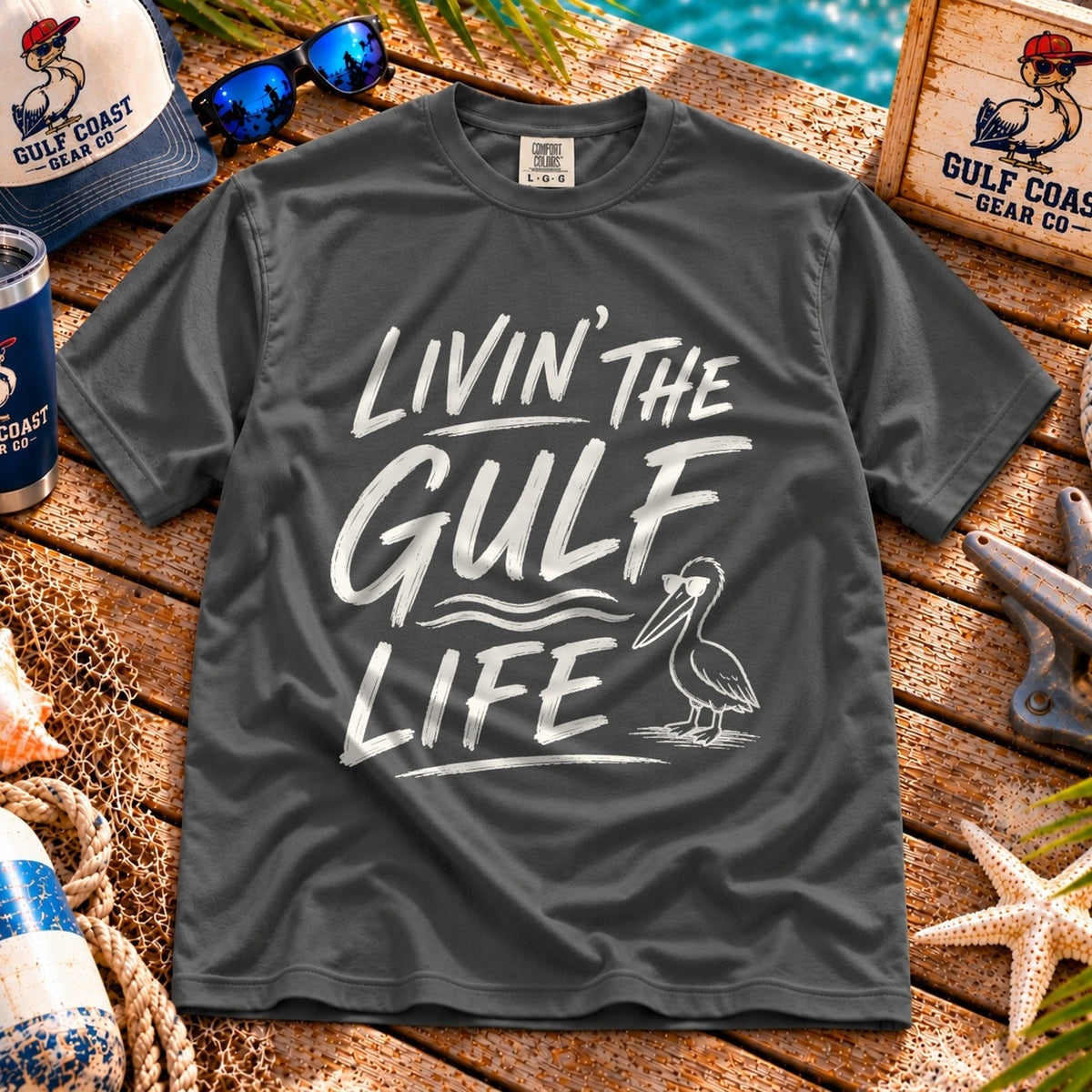 Livin' the Gulf Life heavyweight tee in Pepper, laid flat on dock boards